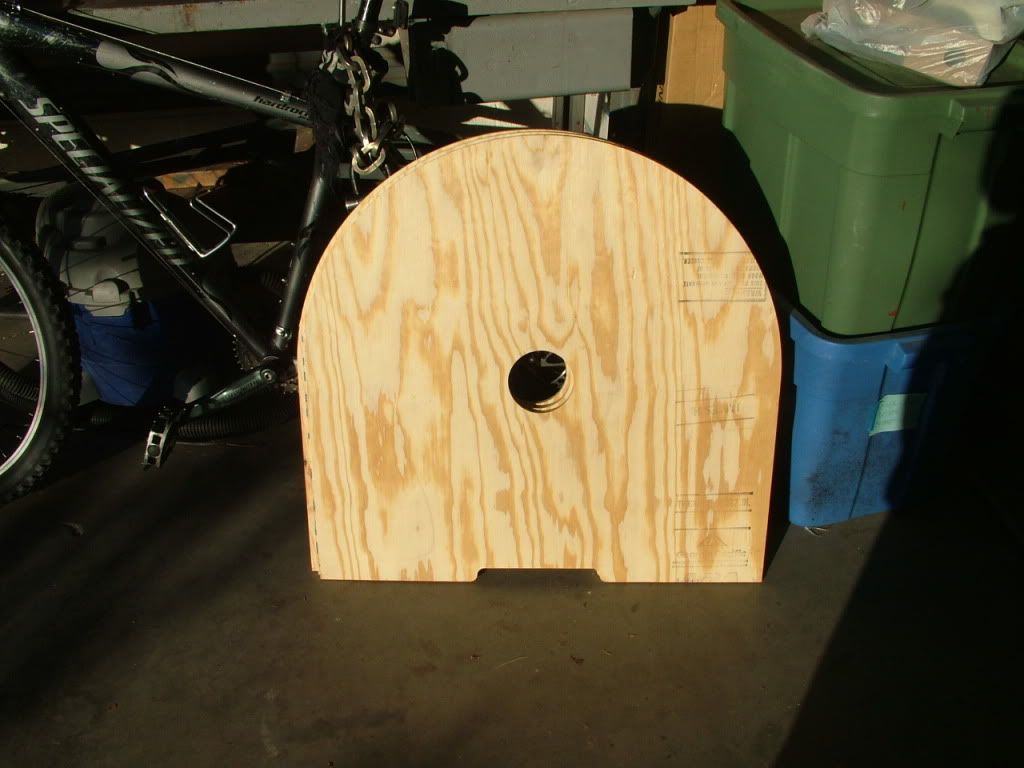 E21 spare tire wheel well cover.