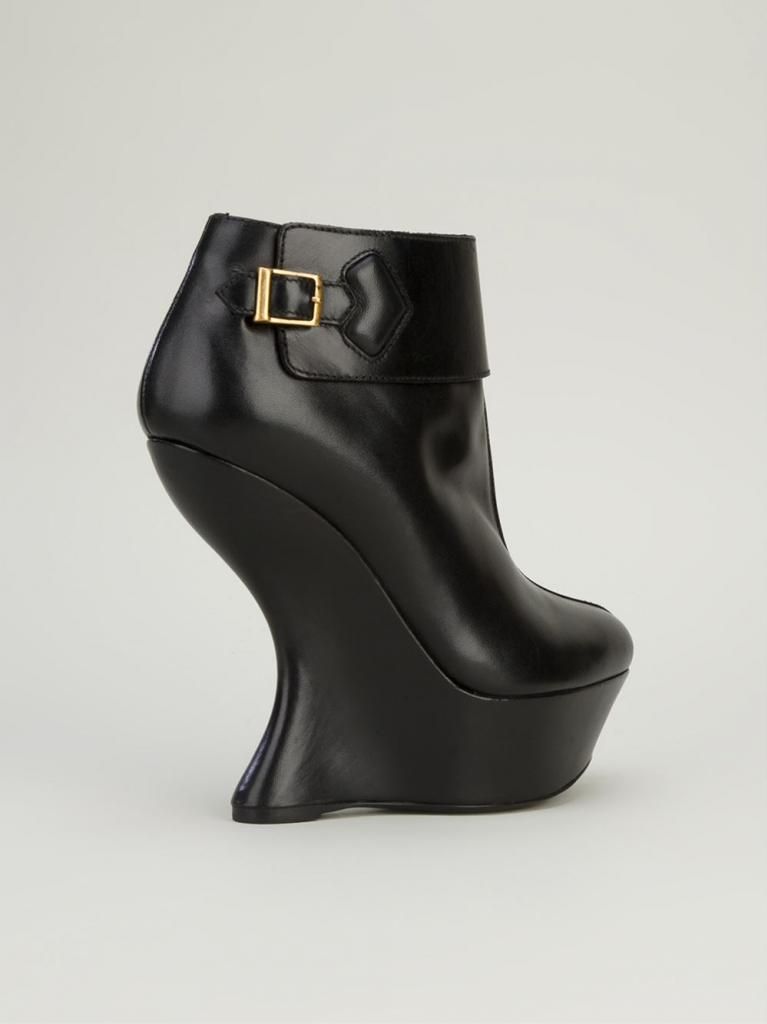  photo alexander-mcqueen-black-curved-heel-leather-ankle-boots10_zpsda4b9199.jpg